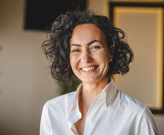 a dental implant patient smiling confidently 