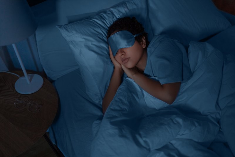 woman sleeping with eye mask